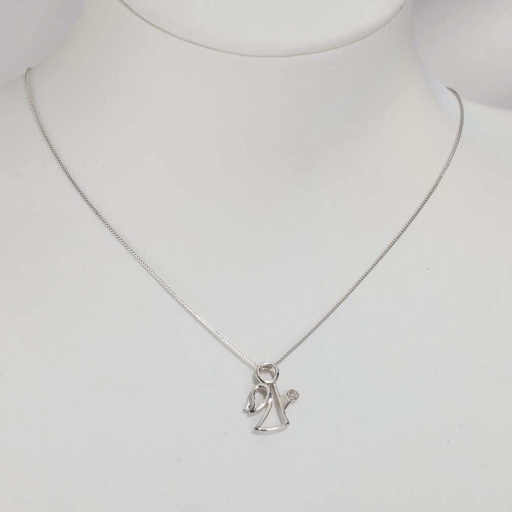 Medál 750/18 K fehér arany Gyémánt 0.007 ct, w-si Angyal