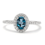 Gyűrű 750/18 K fehér arany London kék topáz ovális, Gyémánt Fehér, 0.19 ct, w-si